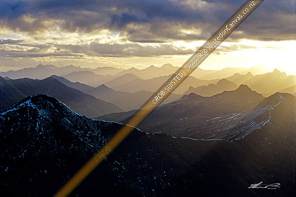 Photo of Sunset silhouettes of the Harris, Forbes and Humboldt Mountains, Mt Aspiring National Park, Queenstown Lakes, Otago Region, New Zealand (NZ)