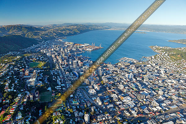 Photo of Wellington City CBD aerial view. City, Harbour and wharves centre. Victoria University left, Hutt Valley distant right, with Tararua Forest Park and Ranges distant., Wellington, Wellington City, Wellington Region, New Zealand (NZ)