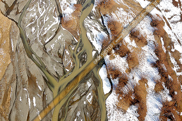 Photo of Awatere River braided river bed aerial view during winter with snow melt coloured water, at Molesworth Station, Molesworth Station, Marlborough, Marlborough Region, New Zealand (NZ)