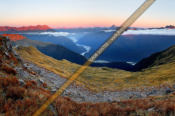 Photo of Haast River Valley sunset from the Thomas Range, Crow Creek. Mount Brewster (2515m) centre left, with Haast Range right distance, Haast, Westland, West Coast Region, New Zealand (NZ)