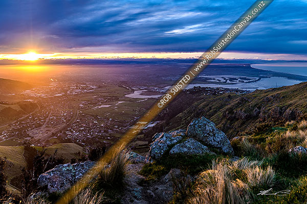 Photo of Christchurch City and Canterbury Plains at sunset, from the Port Hills. Avon Heathcote Rivers estuary and Pegasus Bay right, Port Hills, Christchurch, Christchurch City, Canterbury Region, New Zealand (NZ)