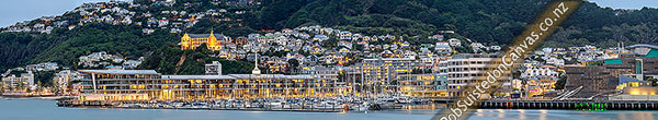 Photo of Wellington City panorama of houses perched on the Mount Victoria Roseneath hillside above the harbour and Oriental Bay, at twilight. St Gerards Monastry left. Panorama, Wellington, Wellington City, Wellington Region, New Zealand (NZ)